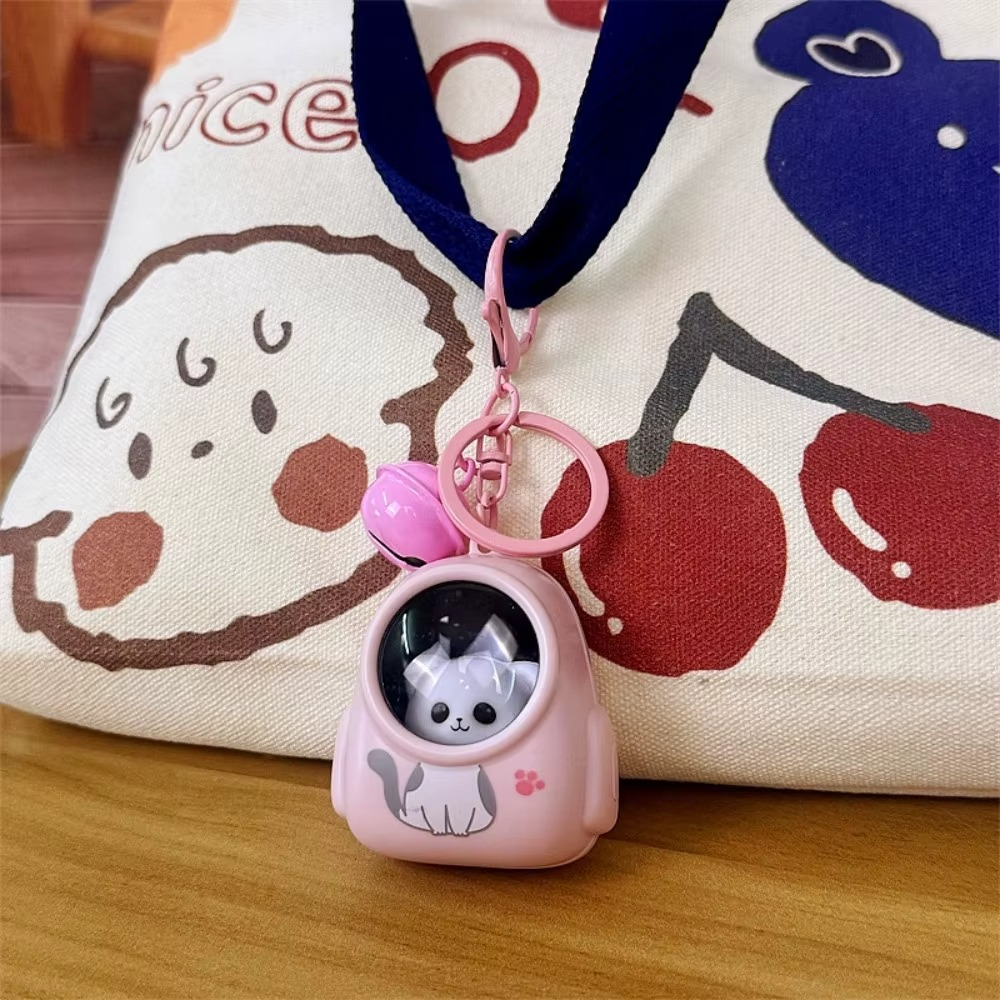 GLOWING ASTRONAUT KEYCHAIN